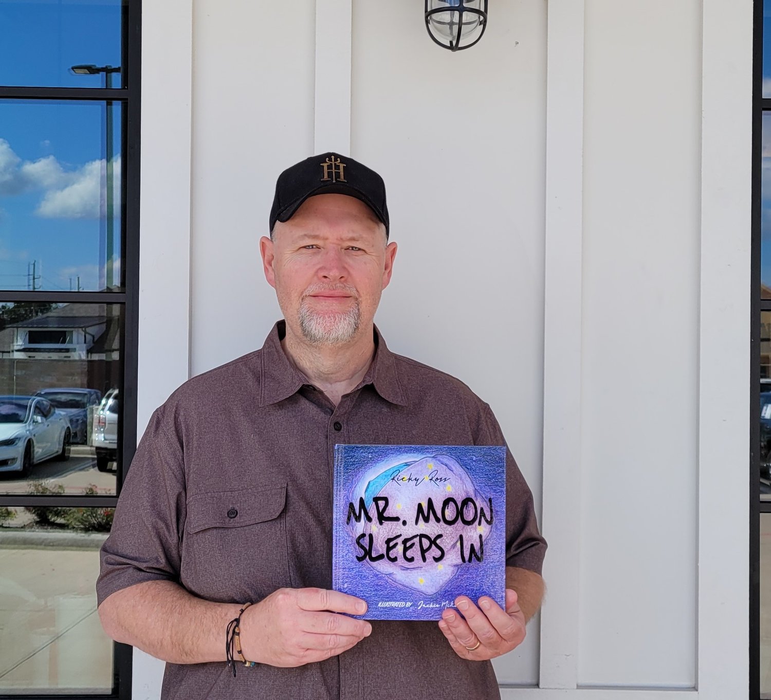 Ricky Ross holds a copy of his first book, “Mr. Moon Sleeps In” which is set for release on Nov. 15. Ross has additional books set for publishing over the next year and a half and is working to donate copies of those books to Katy ISD libraries to support children’s literacy throughout the Katy area.